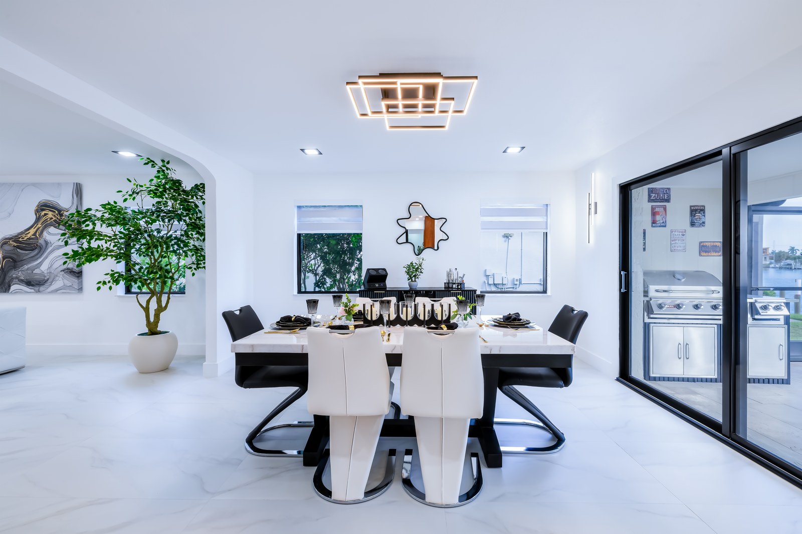 Formal dining table set with black and gold details